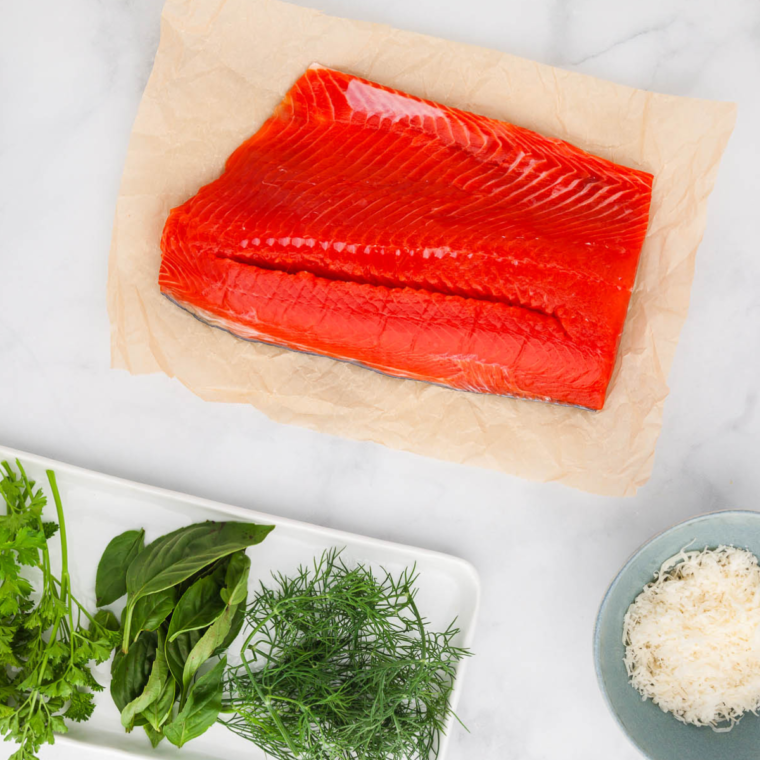 Sockeye salmon fillets patted dry and brushed with an olive oil, lemon, and garlic mixture