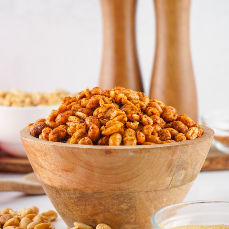 Close-up of homemade Planters Heat Peanuts (Copycat) with a spicy seasoning blend, roasted to perfection for a crunchy and flavorful snack.