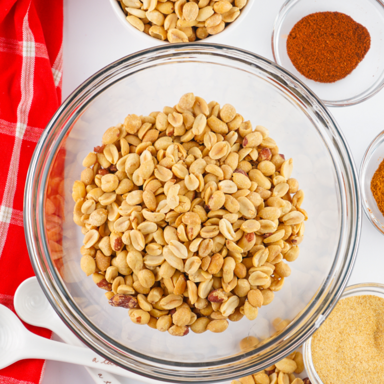 Mixing spices for Planters Heat Peanuts (Copycat) recipe.