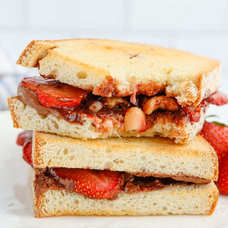 Crispy golden air fryer panini fresh from the basket with toasted artisan bread