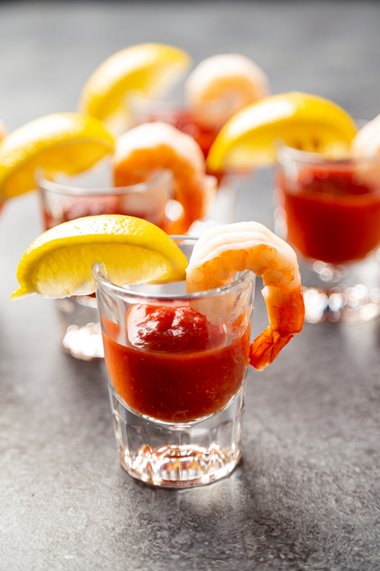 Bowl of tangy cocktail sauce without horseradish served with fresh shrimp.