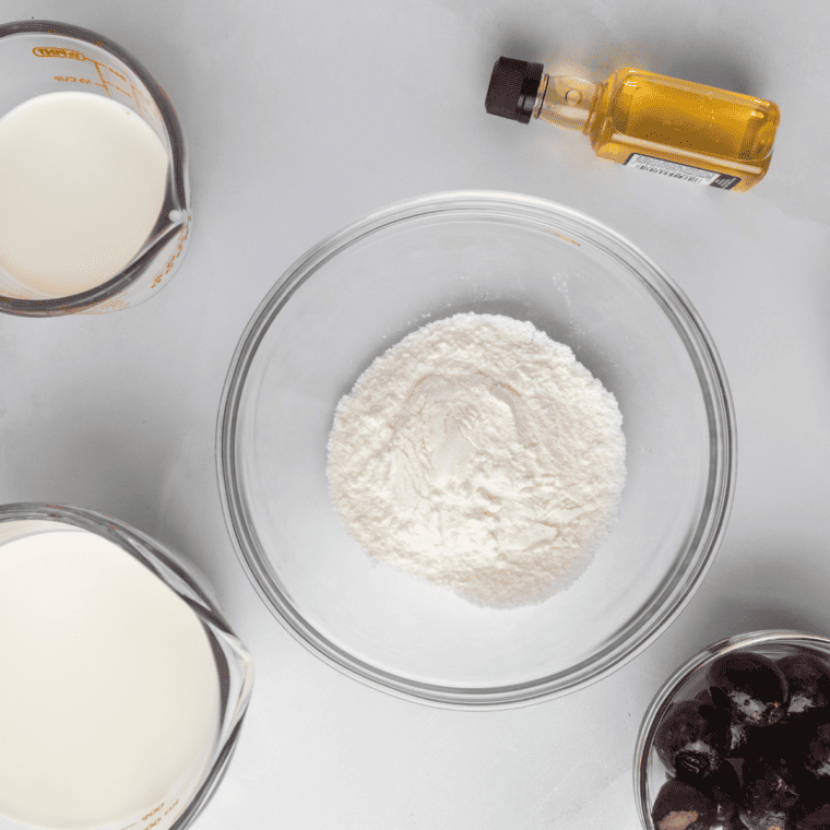 Ingredients Needed For Ninja Creami Boozy Cherry Garcia Ice Cream on kitchen table.