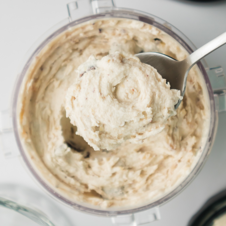 Homemade Ninja Creami Copycat Ben & Jerry’s Chunky Monkey ice cream with chocolate chunks and walnuts in a bowl.