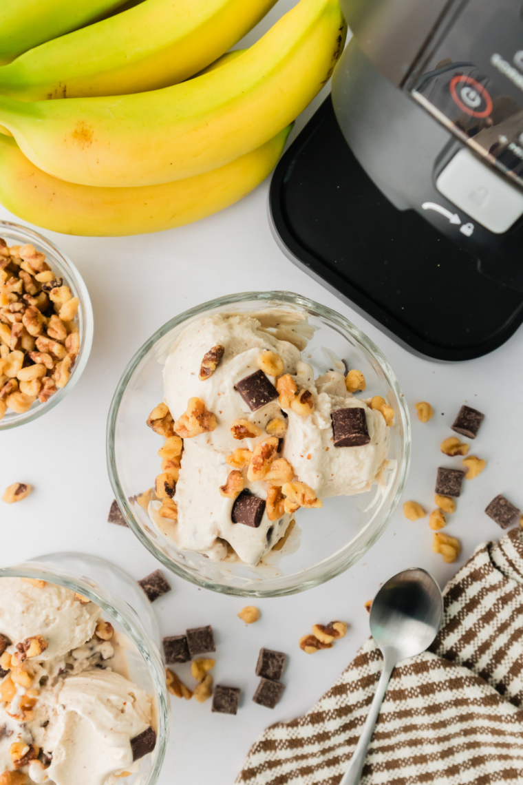 Homemade Ninja Creami Copycat Ben & Jerry’s Chunky Monkey ice cream with chocolate chunks and walnuts in a bowl.