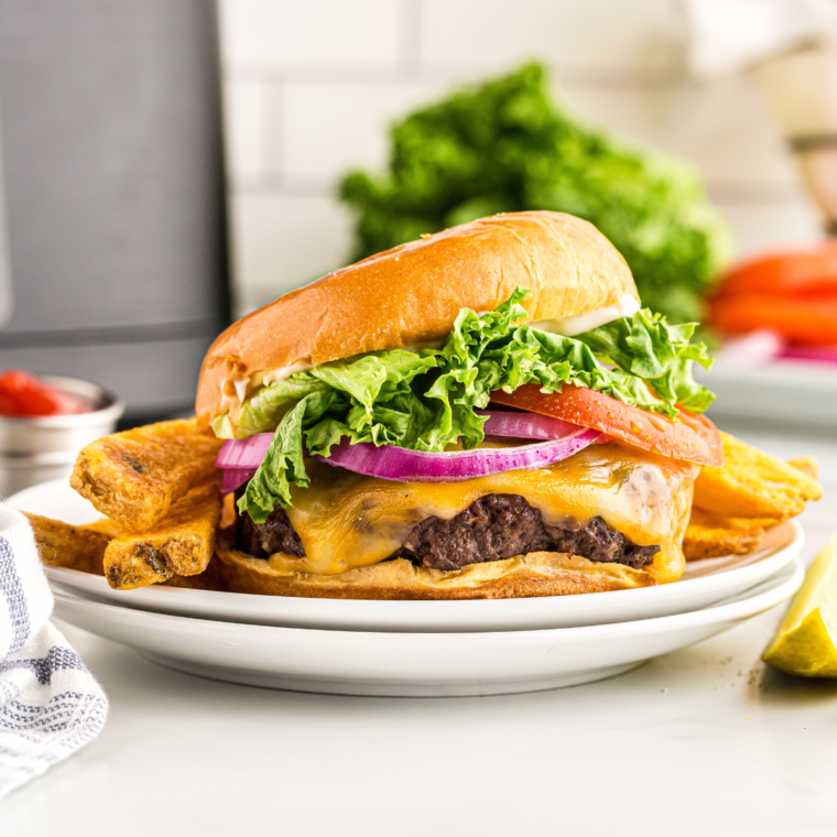 Perfectly cooked Ninja Foodi hamburgers, juicy and ready to serve.
