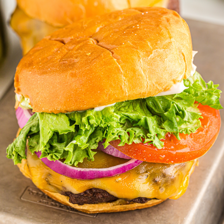 Delicious and juicy Ninja Foodi hamburgers, perfectly cooked and ready to enjoy.