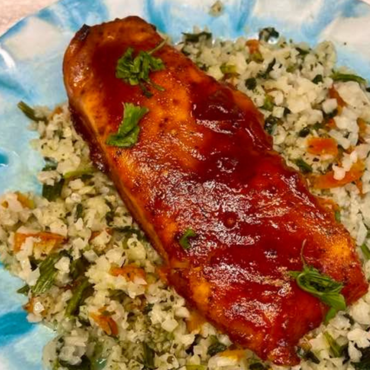 Sea Cuisine Salmon fillets cooking in the Air Fryer at 400°F, golden and crispy.