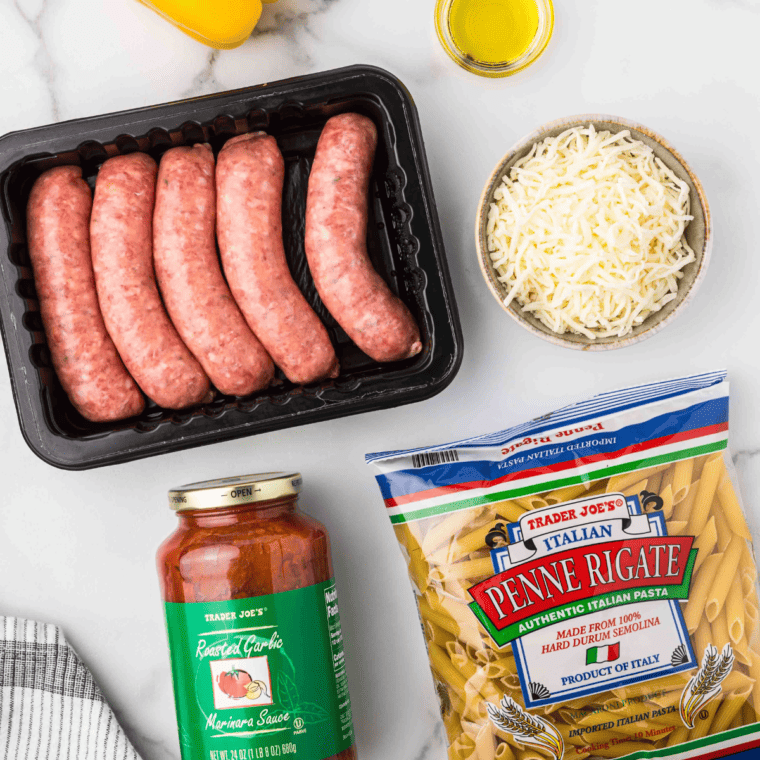 Large pot of salted water coming to a boil on stovetop for Trader Joe's sausage pasta