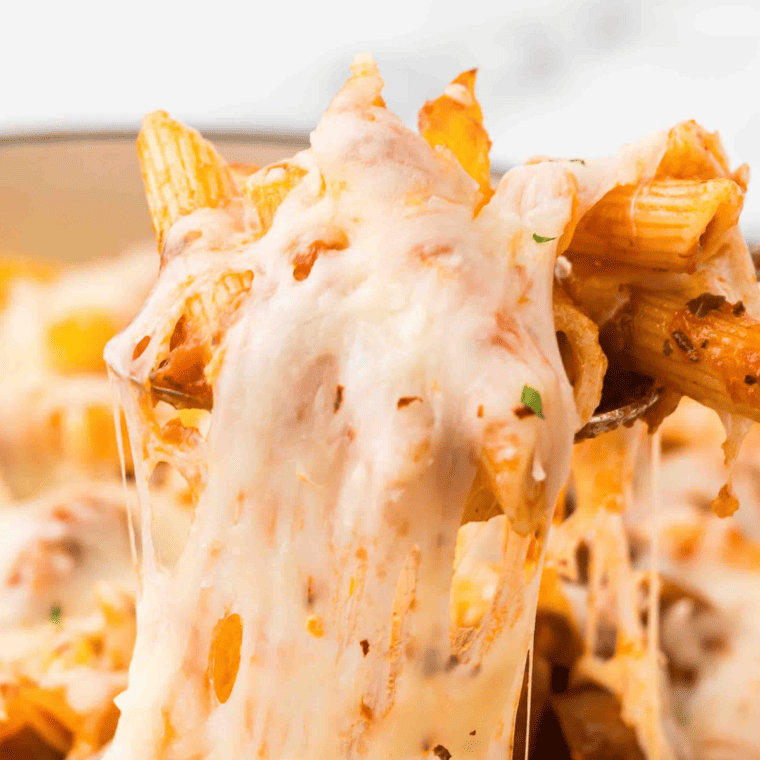 close-up sausage pasta with Trader Joe’s sausage and parmesan topping