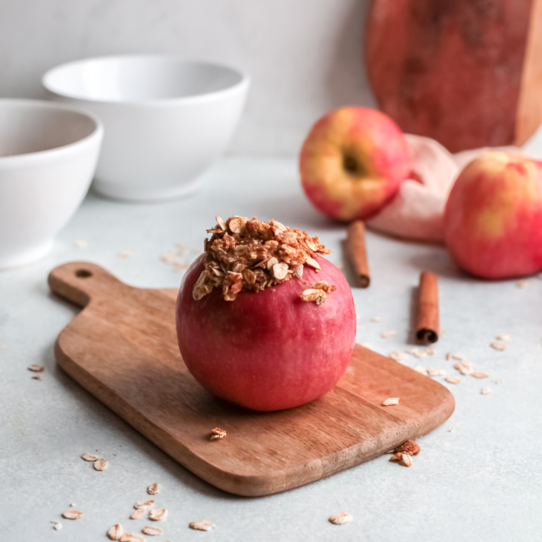 Apples stuffed with oat filling, packed tightly and slightly mounded on top before air frying.