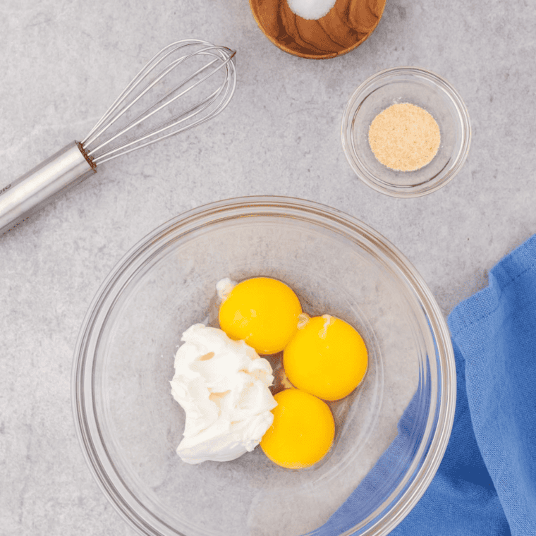 In a large glass bow, whisk the eggs, and slowly add in the other ingredients.