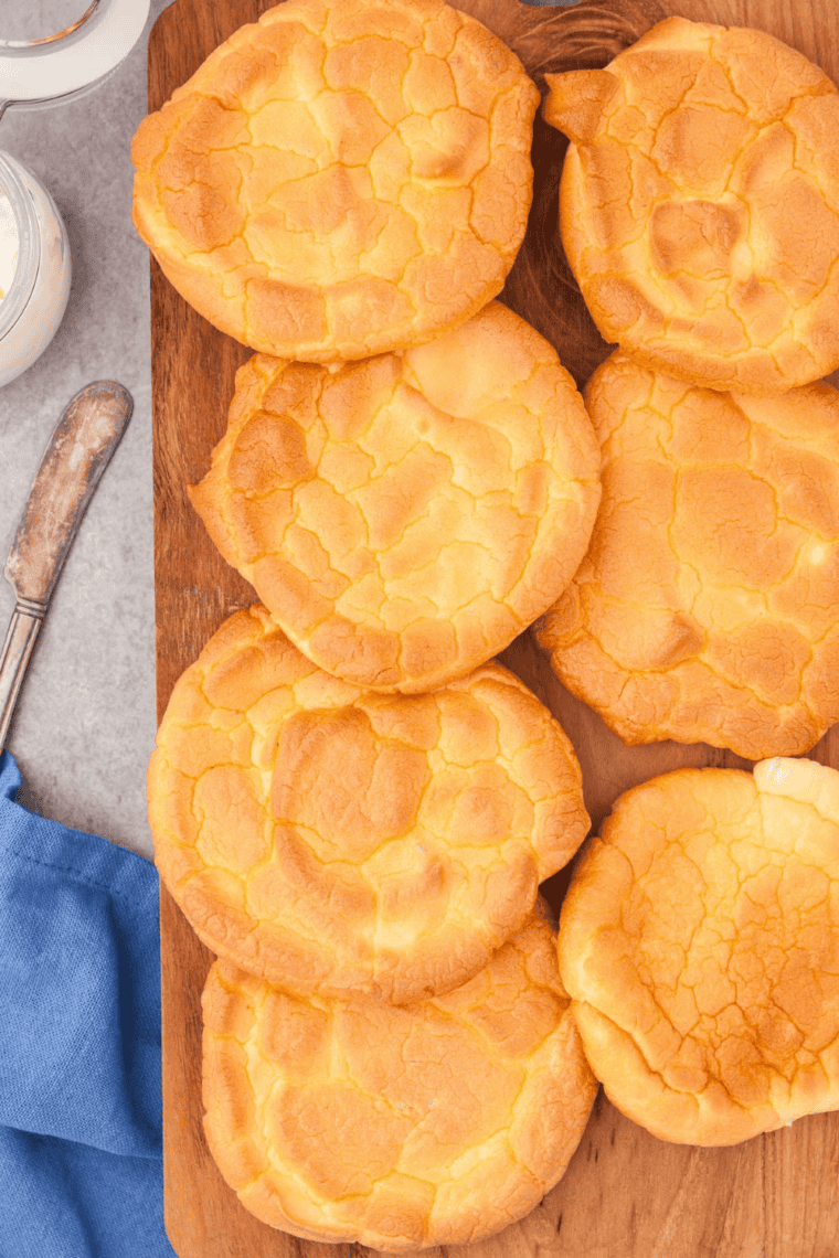 Fluffy, low-carb Air Fryer Cloud Bread with a light, airy texture on a white plate."