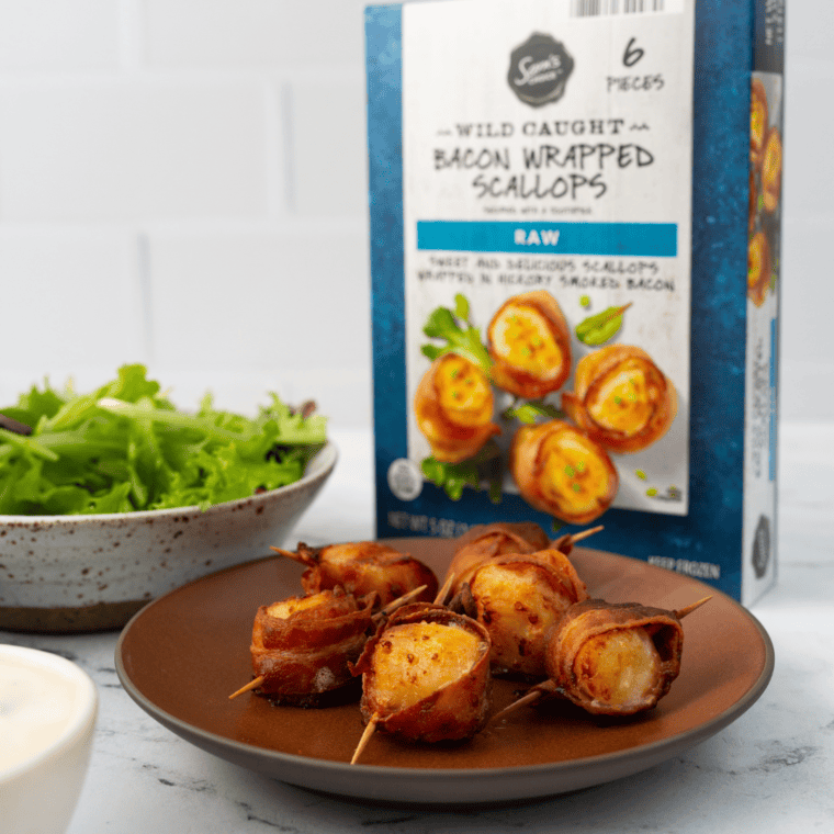 Golden, crispy frozen bacon-wrapped scallops cooked in the air fryer, served hot.