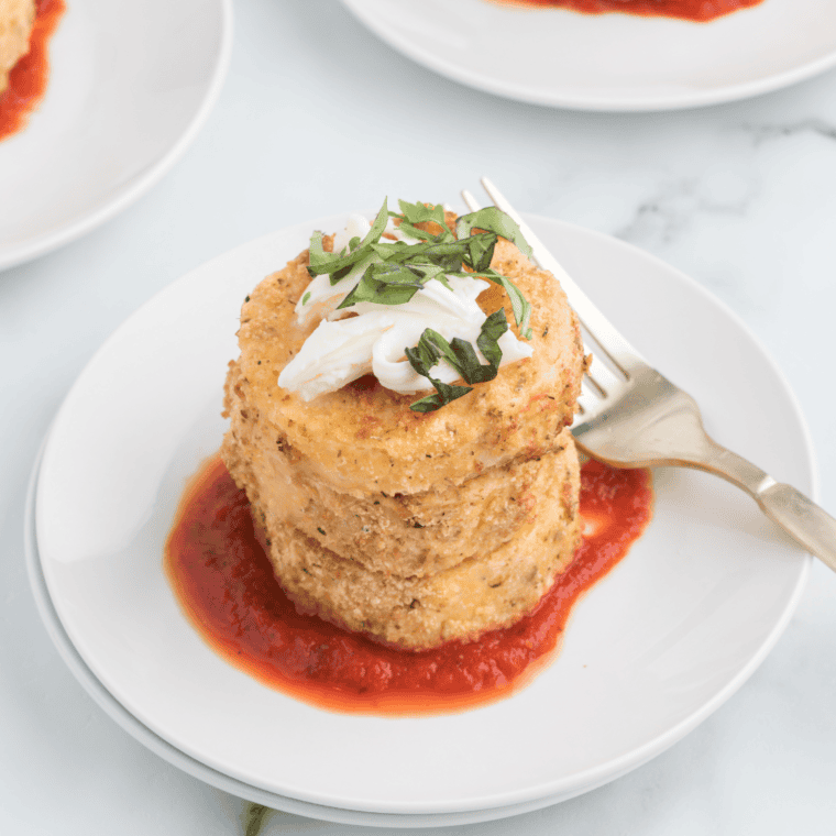 Crispy golden Air Fryer Polenta Cakes served as a delicious appetizer.
