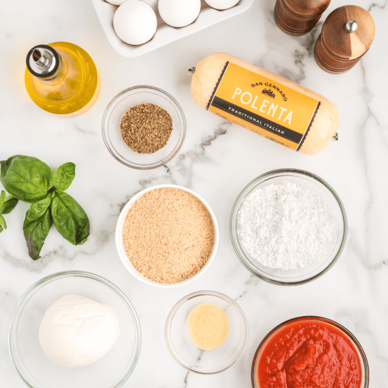 Ingredients needed for Air Fryer Polenta Cakes on kitchen table.