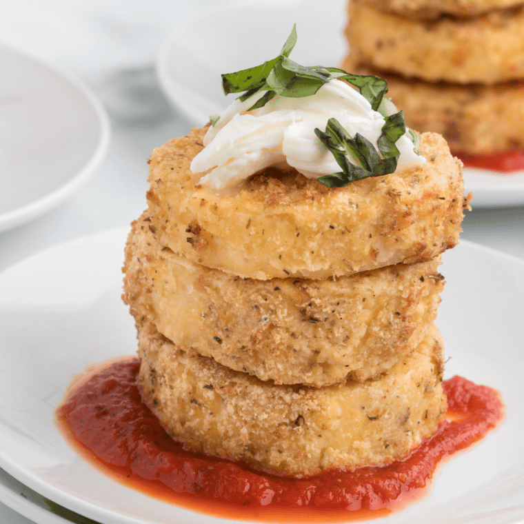 Crispy Air Fryer Polenta Cakes with a golden exterior.