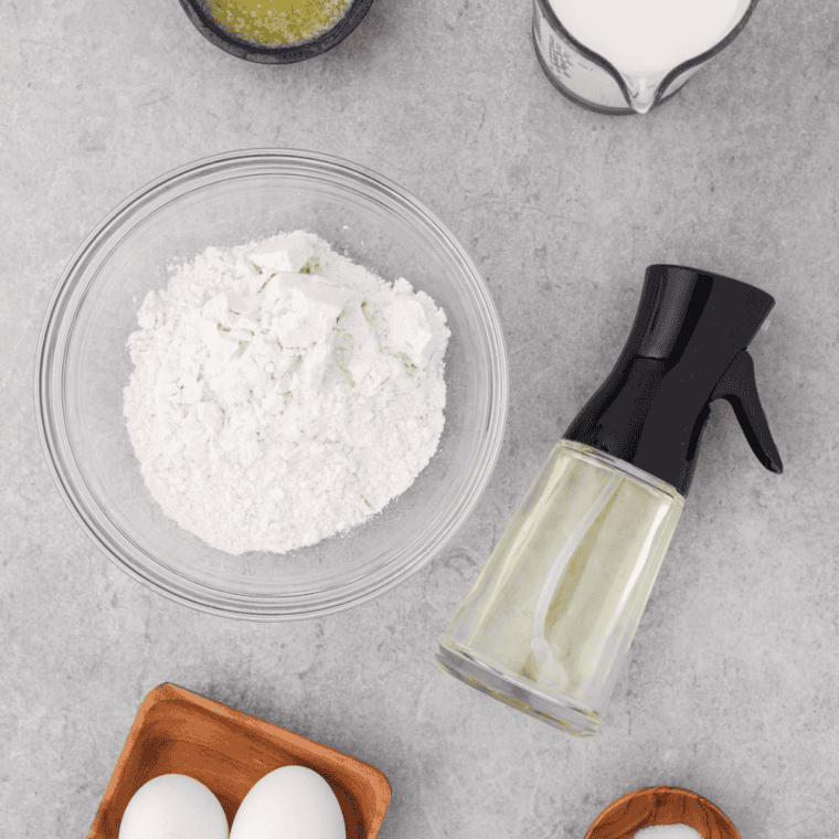 Ingredients needed for Easy Air Fryer Popovers Recipe on kitchen table.