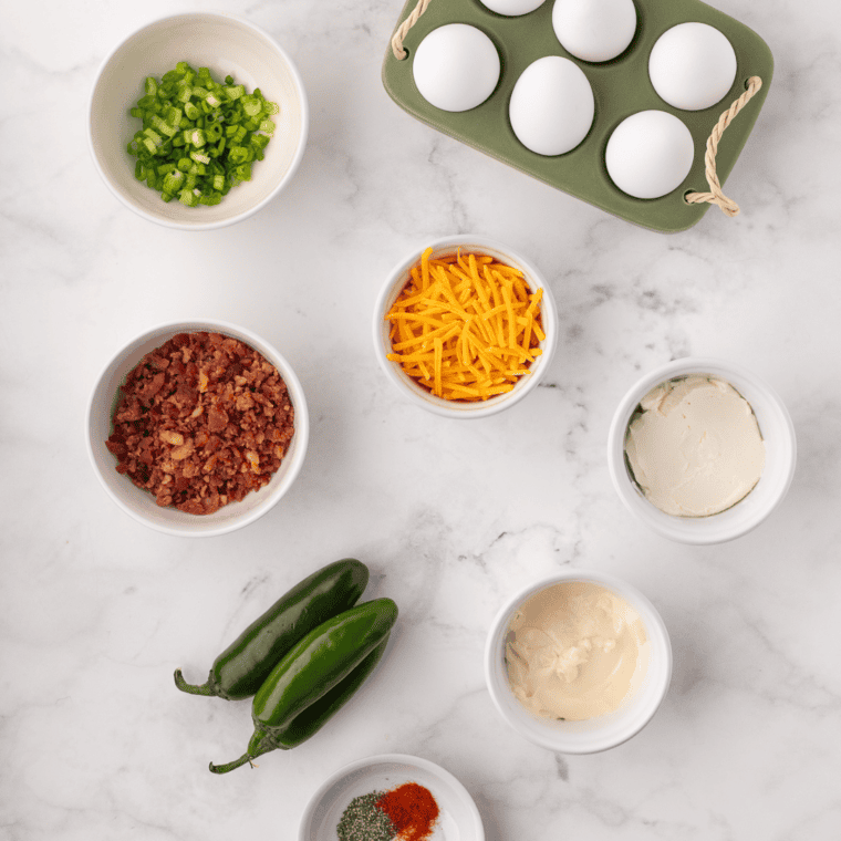Ingredients for bacon jalapeño deviled eggs: eggs, bacon, jalapeños, mayonnaise, Dijon mustard and lemon