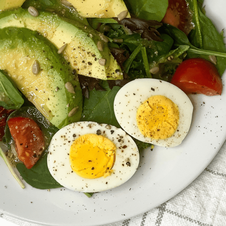 Perfectly cooked Ninja Foodi hard-boiled eggs in an ice water bath, easy to peel and ready to enjoy.
