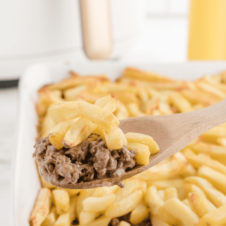 Finished cheeseburger fry casserole with golden crispy fries fresh from the air fryer