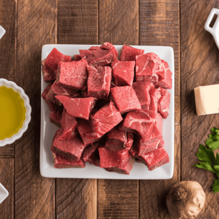 Ingredients laid out - A flat lay of all ingredients needed for Air Fryer Chili Con Carne, including beef, beans, tomatoes, and spices arranged neatly on a kitchen counter.