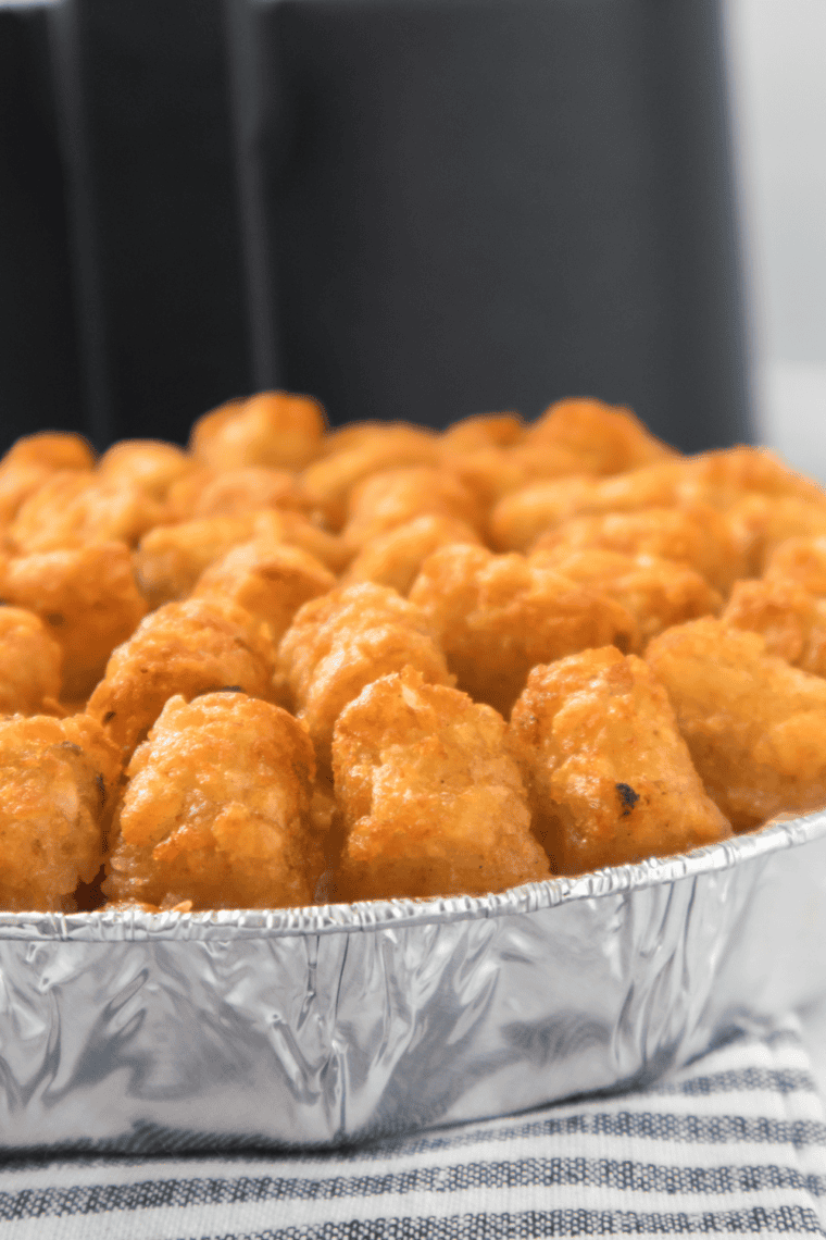 Finished air fryer cowboy casserole served in a white dish, ready to eat