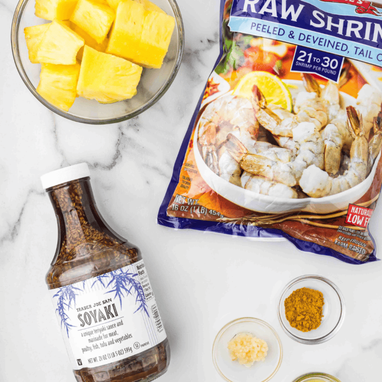 Ingredients needed for Easy Air Fryer Hawaiian Shrimp Kabobs on kitchen table.