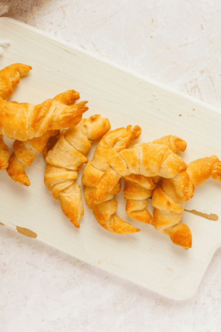 Freshly baked homemade croissants in the air fryer with golden flaky layers.