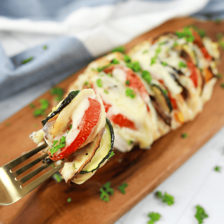 Golden-brown stuffed chicken breast cooked in an air fryer.