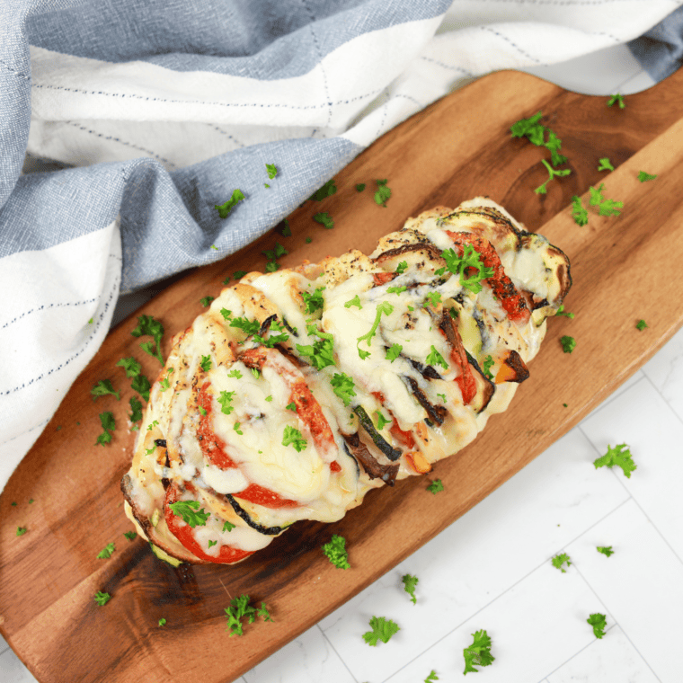
This primavera-stuffed chicken recipe allows you to cook both the chicken and vegetables simultaneously for a quick and convenient meal.