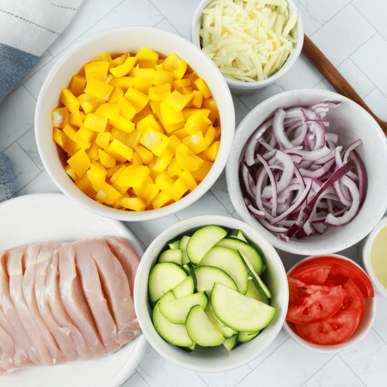 Air Fryer Primavera Stuffed Chicken ingredients on table.
