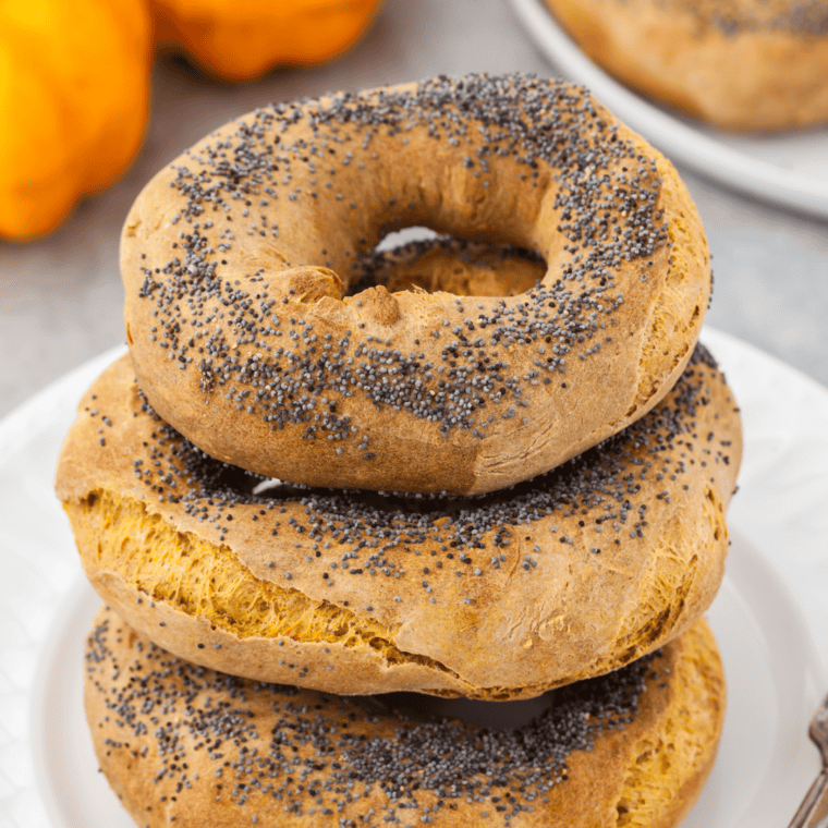 Air Fryer Pumpkin Bagels topped with poppy seeds