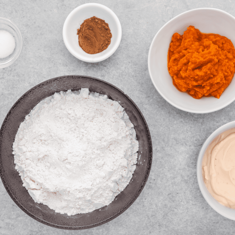 Ingredients needed for this pumpkin bagels recipe in individual bowls