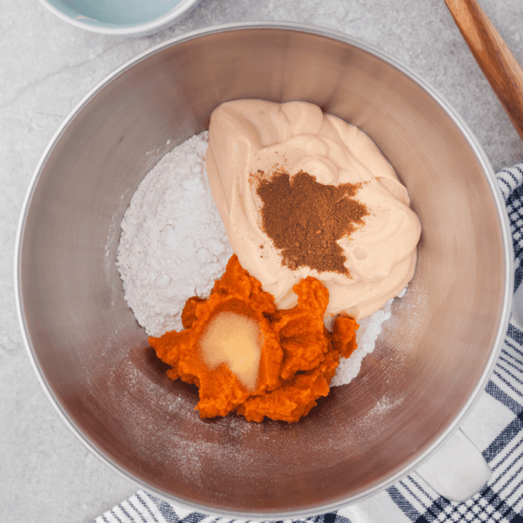 Ingredients for air fryer pumpkin bagels recipe in a metal mixing bowl