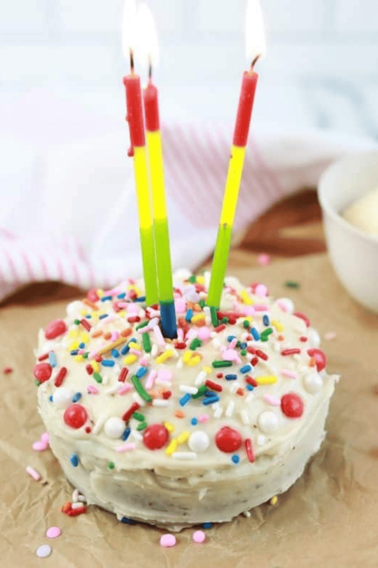 Mini Air Fryer Smash Cake decorated with colorful frosting and sprinkles, perfect for a first birthday celebration.