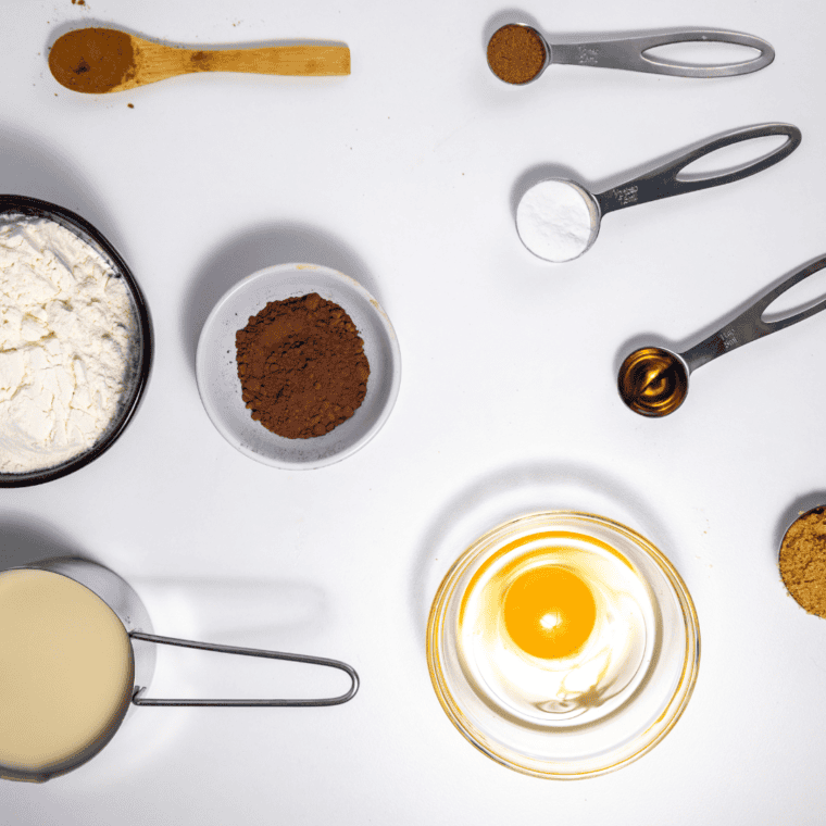 Ingredients needed for Brown Sugar Pancakes Recipe (Fluffy, Buttermilk, with Maple Syrup in the Batter) on kitchen table.