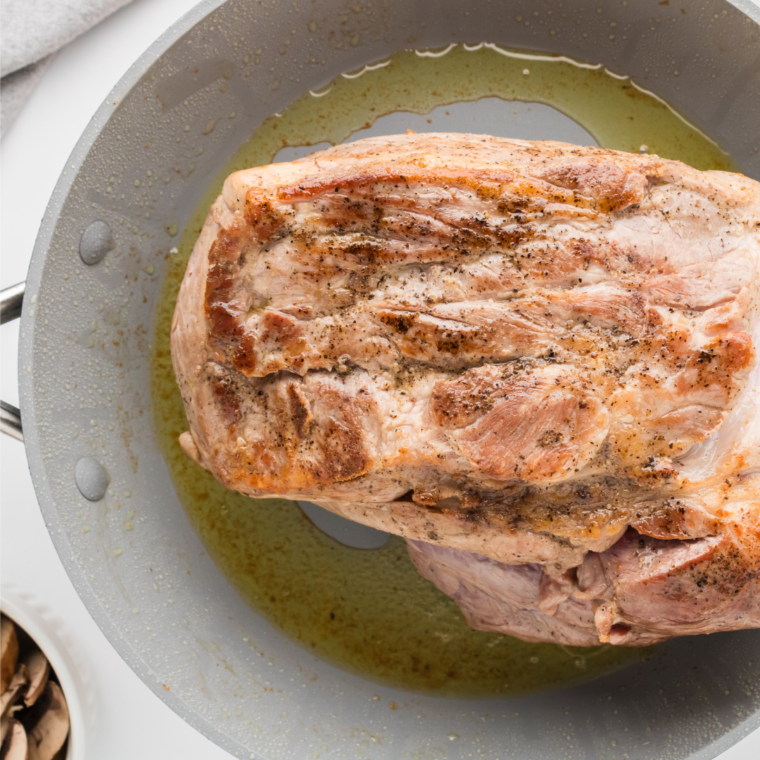 Sear the pork roast in a skillet or cast iron pan