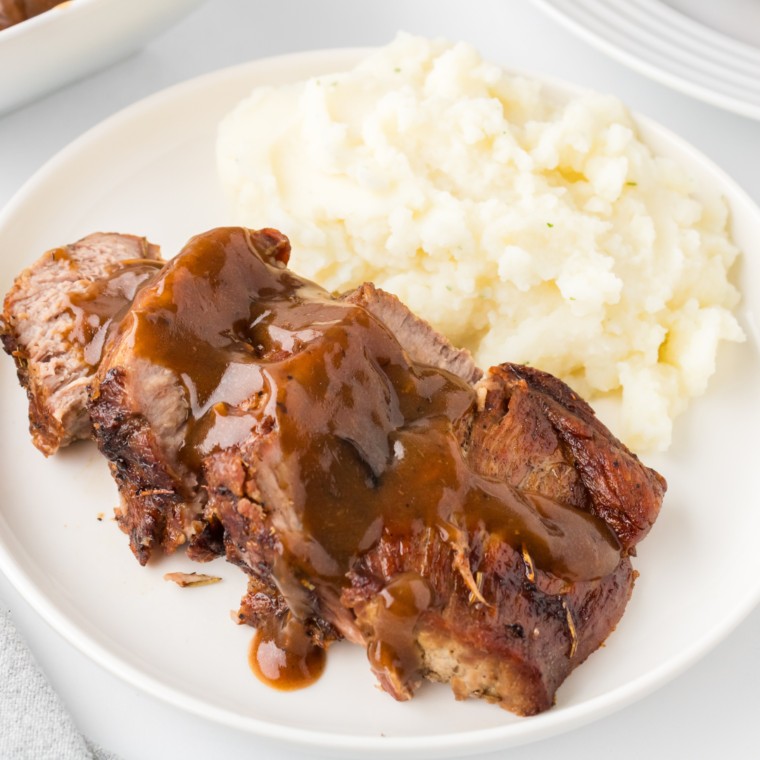 "Delicious homemade Copycat Cracker Barrel Pot Roast served with vegetables"