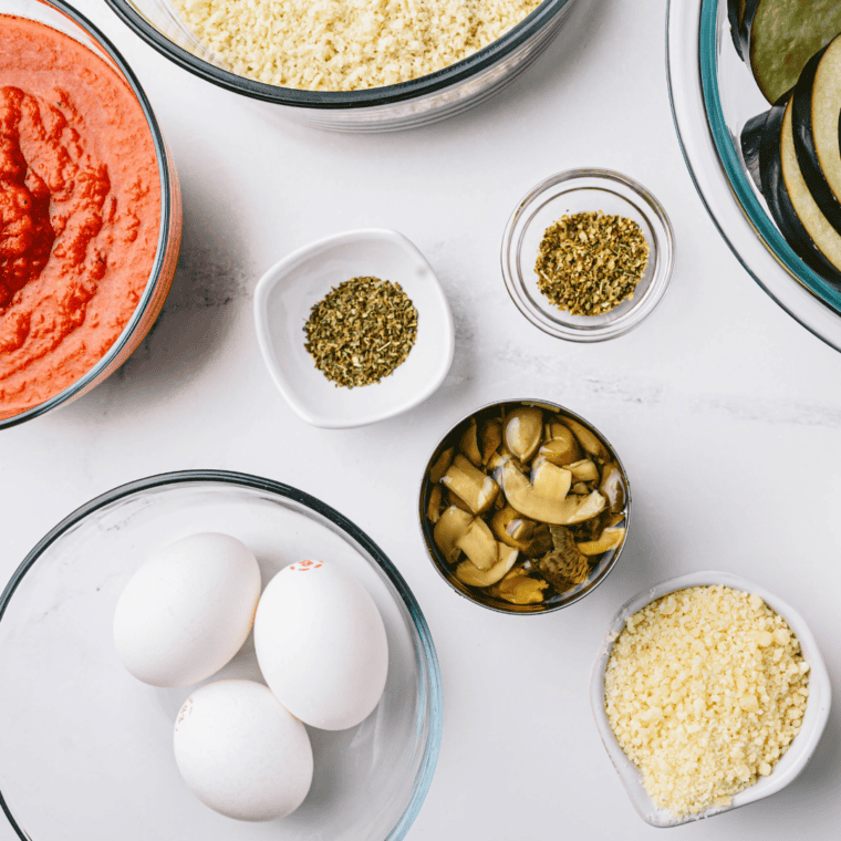 Ingredients For the Olive Garden's Eggplant Parmesan Recipe on table.