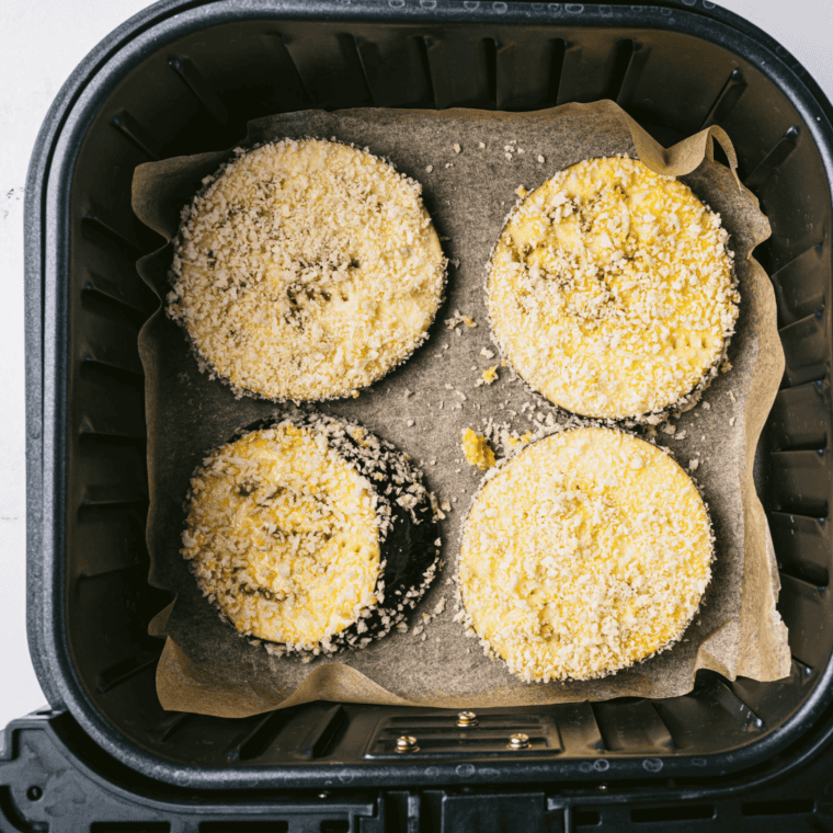 Air Frying breaded eggplant slices until golden brown for Olive Garden's Eggplant Parmesan.