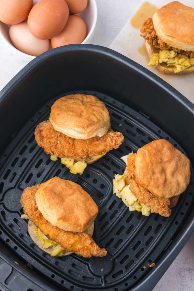 Air Fryer Chicken Biscuit Sandwiches with honey-drizzled chicken between two fluffy biscuits