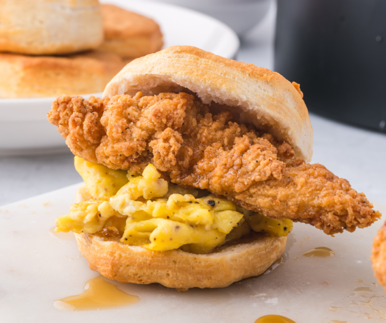 A stack of easy Air Fryer Chicken Biscuit Sandwiches ready to serve