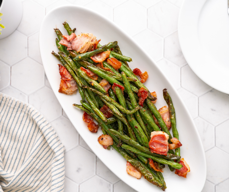 Air-fried green beans mixed with crispy bacon pieces, served golden and flavorful.