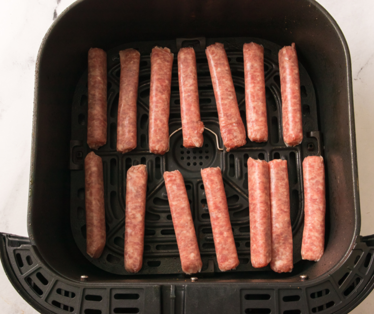 Johnsonville Breakfast Sausage in air fryer basket.