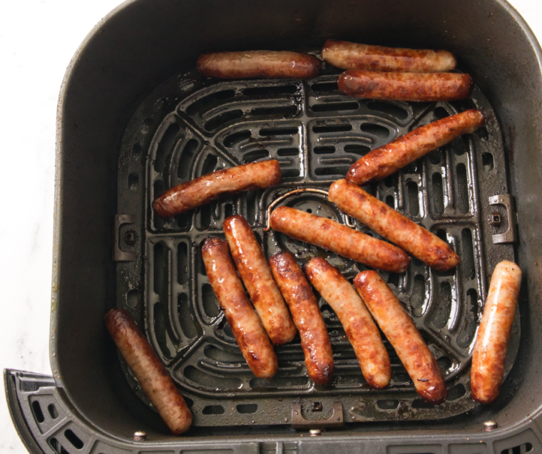 Crispy Air Fryer Johnsonville Breakfast Sausage served with eggs.