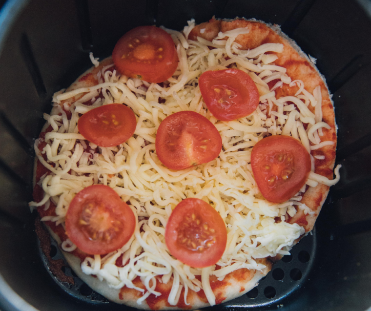 Place the Panera Margherita Flatbread Pizza Recipe into the air fryer basket.