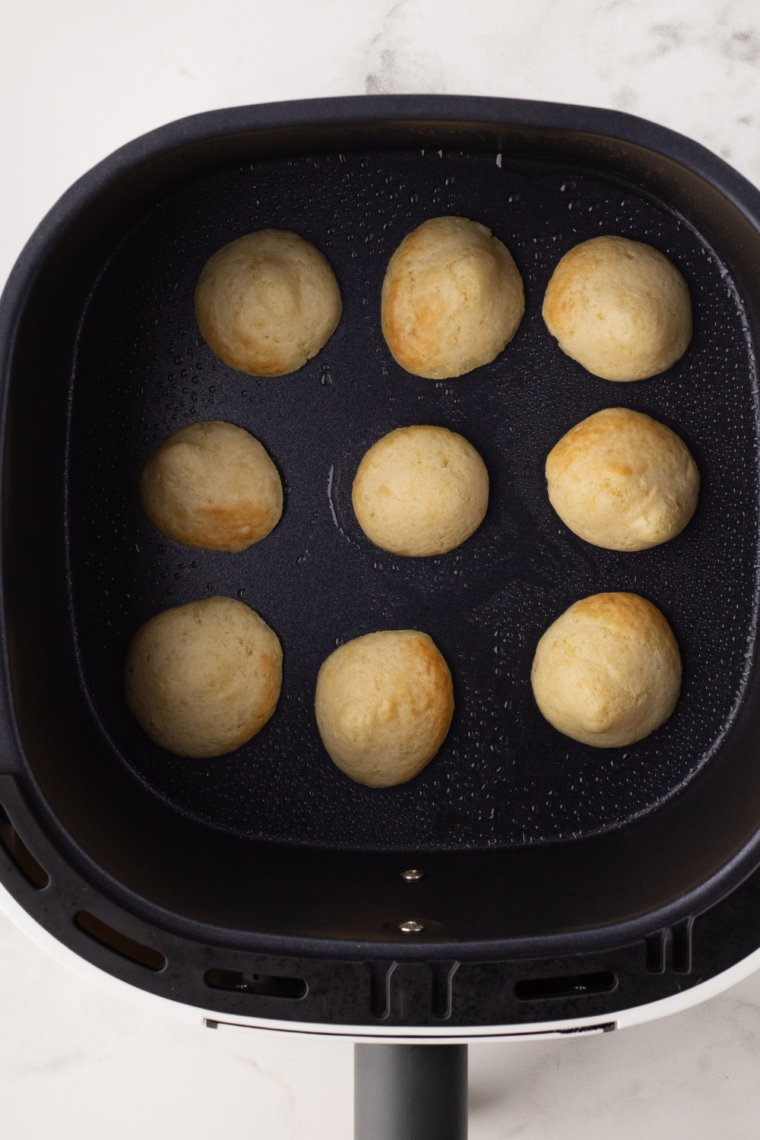 Air frying pancake cereal until golden brown and puffed, flipping halfway through for even cooking, and serving with traditional toppings like syrup, berries, or yogurt.