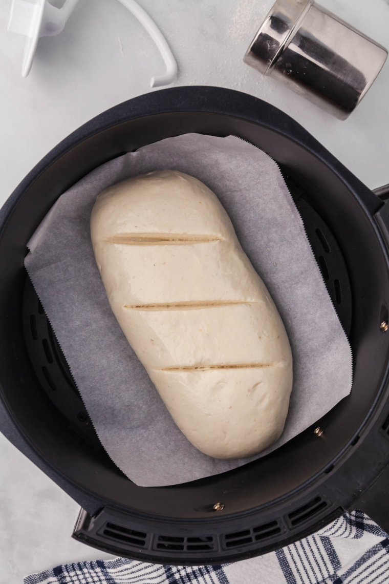 Folding and shaping air fryer sourdough bread to create surface tension