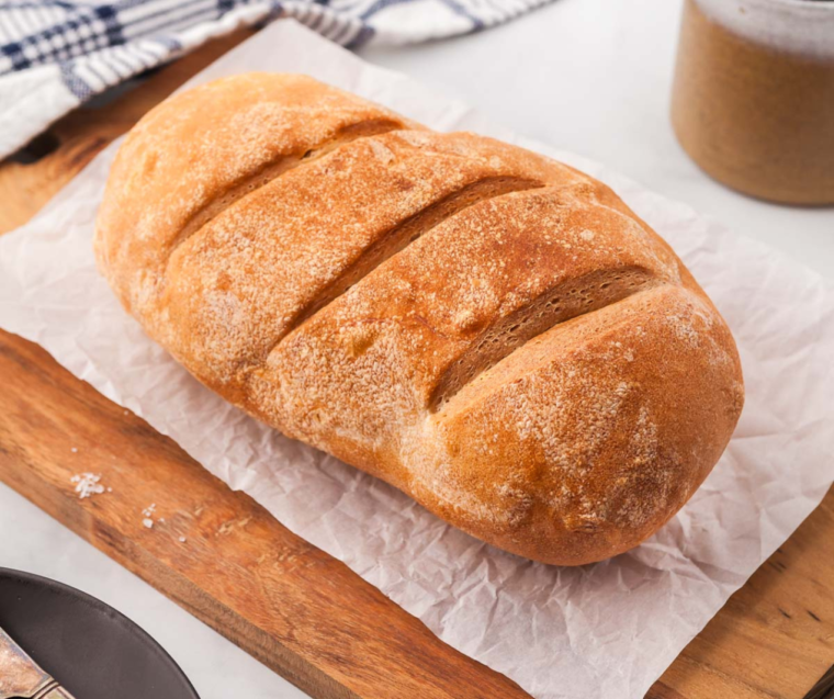 Close-up of homemade air fryer sourdough bread with a crispy golden crust