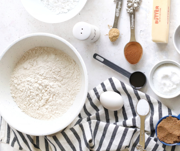 Ingredients needed for Air Fryer Gingerbread Crinkle Cookies on kitchen table.